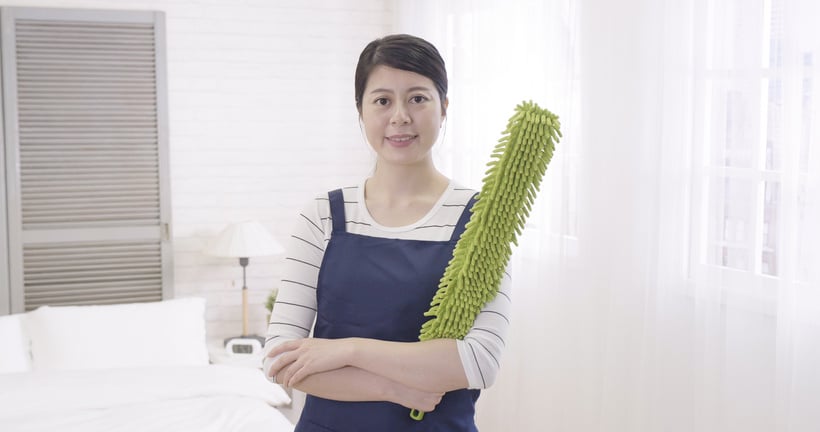 confident professional asian domestic worker